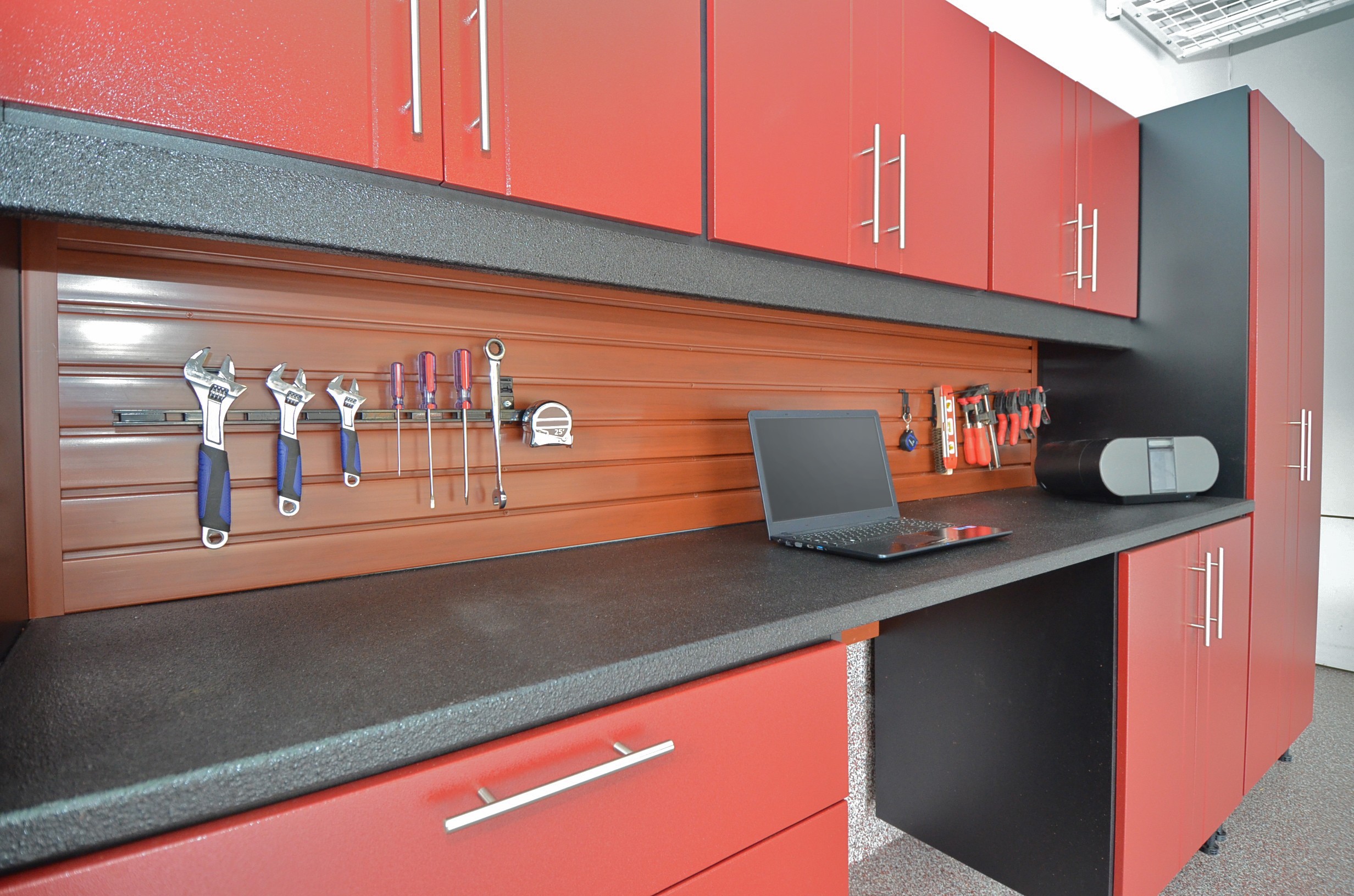 SlatWall Panels & SlatWall Accessories Above A WorkSpace Garage Cabinets Workbench Area
